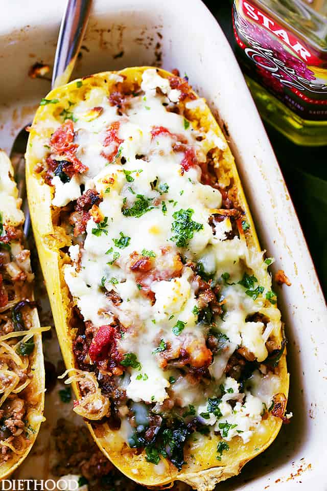 Mediterranean Spaghetti Squash Boats - Delicious, healthy, easy to make Spaghetti Squash boats loaded with ground turkey, tomatoes, kale and feta cheese.