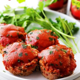Quick Mini Meatloaves - Quick, easy and delicious mini meatloaves topped with a sweet, yet tangy tomato sauce and baked in muffin cups.
