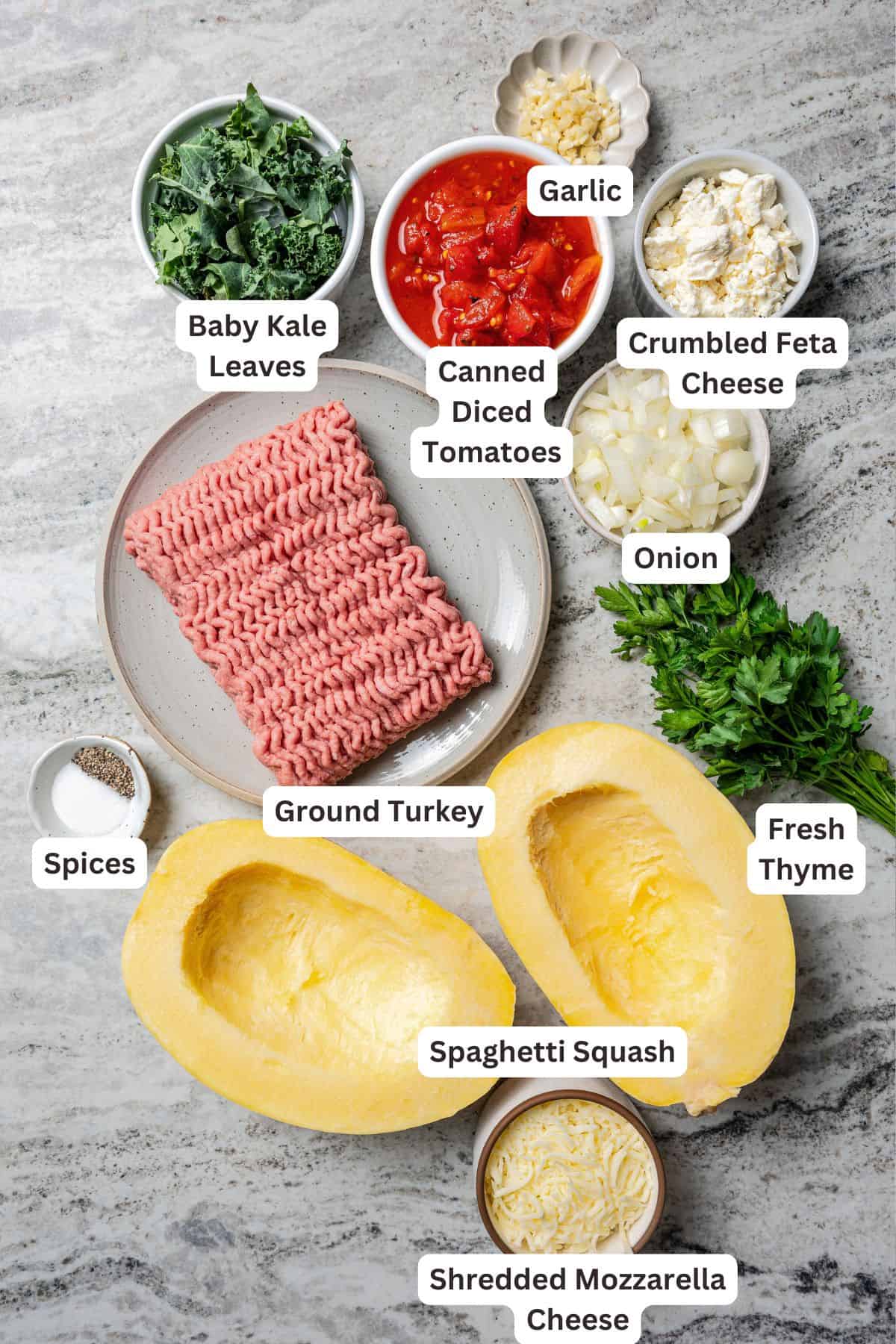 Ingredients for Mediterranean-inspired spaghetti squash boats with text labels overlaying each ingredient.