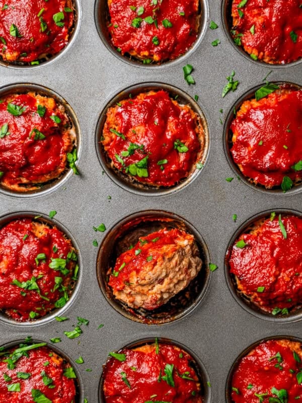 Baked mini meatloaf in a muffin pan.