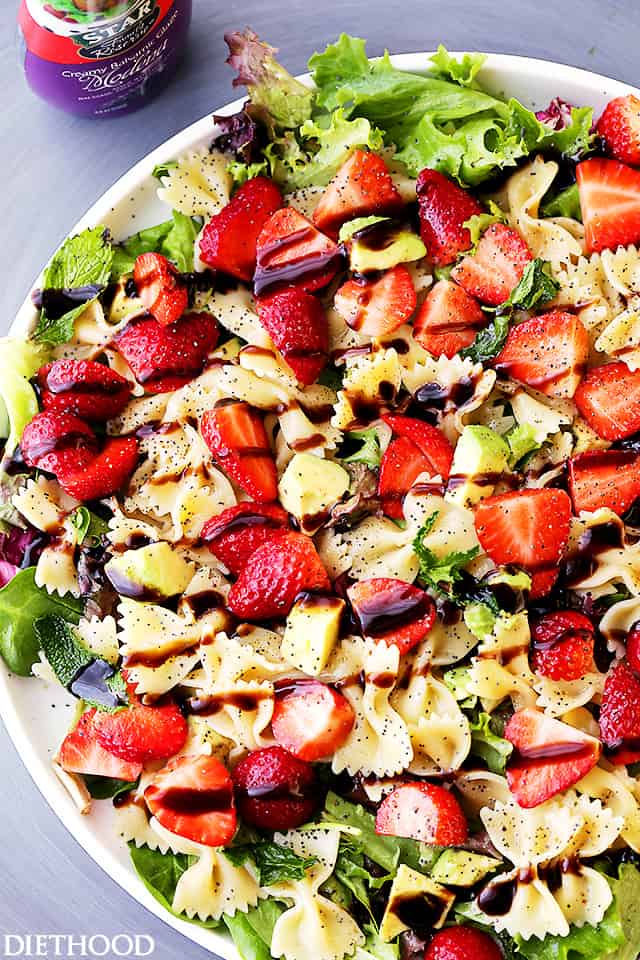 Strawberry Avocado Pasta Salad with Balsamic Glaze Recipe - Strawberries, avocados and bow tie pasta all tossed with an irresistibly creamy balsamic glaze!