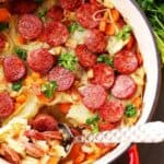 Dublin Coddle on steaming pot with savory sausages.