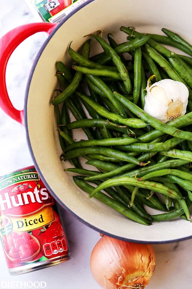 Fresh green beans and garlic in a pot