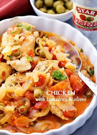 Skillet Chicken with Tomatoes and Olives - Packed with sweet tomatoes and salty olives, this delicious and easy chicken dinner is sure to impress! Easy enough for weeknights, fancy enough for dinner guests.