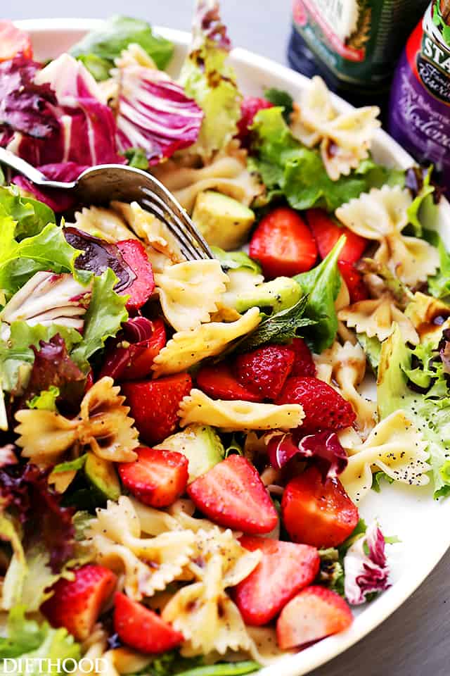 Strawberry Avocado Pasta Salad with Balsamic Glaze Recipe - Strawberries, avocados and bow tie pasta all tossed with an irresistibly creamy balsamic glaze!