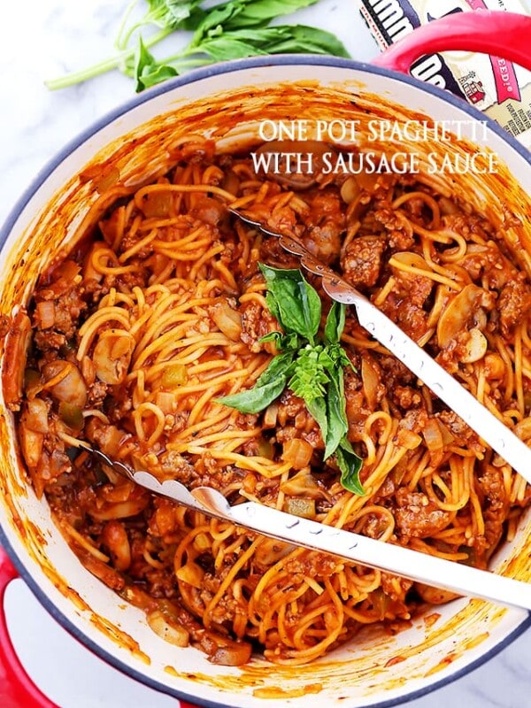 One Pot Spaghetti with Sausage Sauce Recipe - Made with pork sausage, peppers, mushrooms and pasta, this easy, one pot dinner recipe is on the table in just 30 minutes!