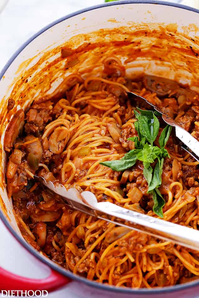 One Pot Spaghetti with Sausage Sauce Recipe - Made with pork sausage, peppers, mushrooms and pasta, this easy, one pot dinner recipe is on the table in just 30 minutes!