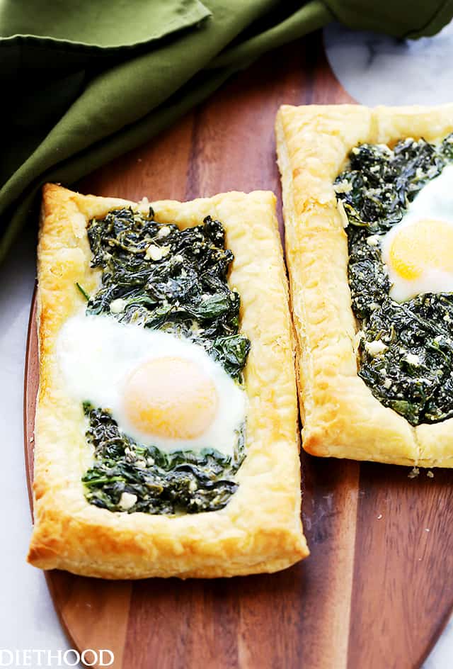Spinach and Feta Puff Pastry Breakfast Tart Recipe - In just a few minutes of prep time, you can have this ridiculously easy, yet incredibly flavorful golden puff pastry topped with spinach, feta, and eggs. Perfect for breakfast, brunch, or even as an appetizer.
