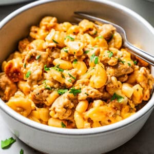 Homemade hamburger helper in a bowl with a fork.