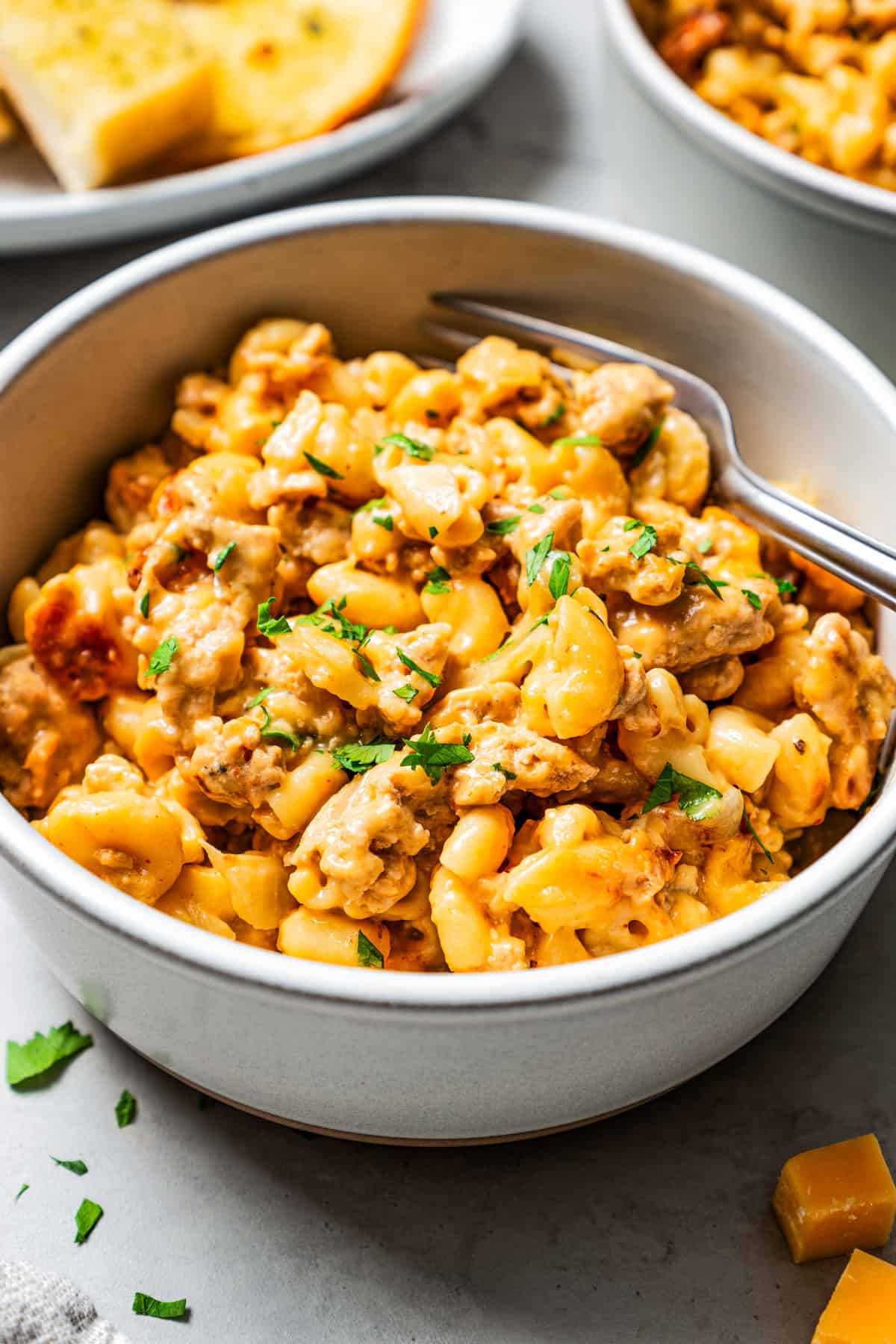 Homemade hamburger helper in a bowl with a fork.