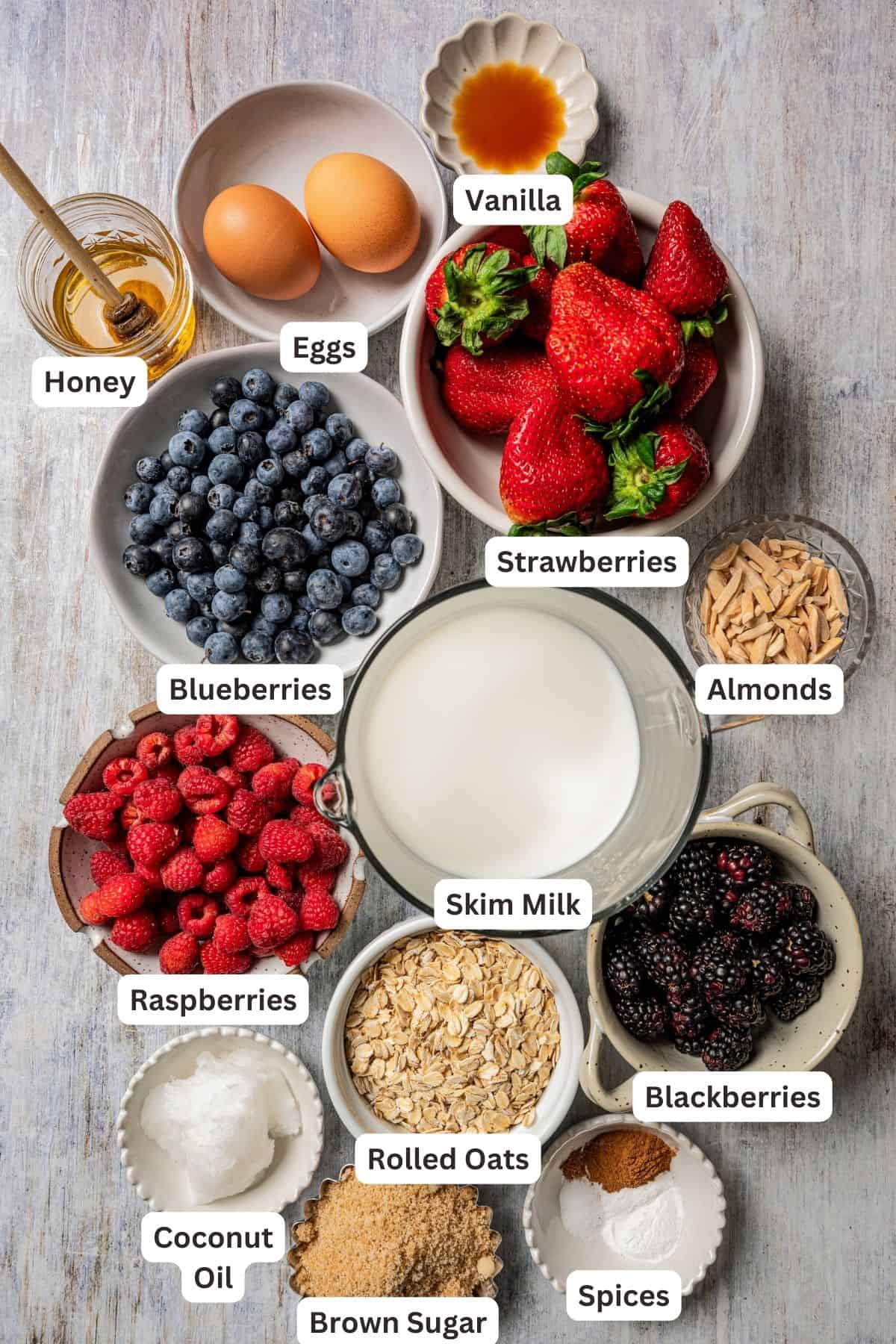 Baked oatmeal ingredients with text labels overlaying each ingredient.