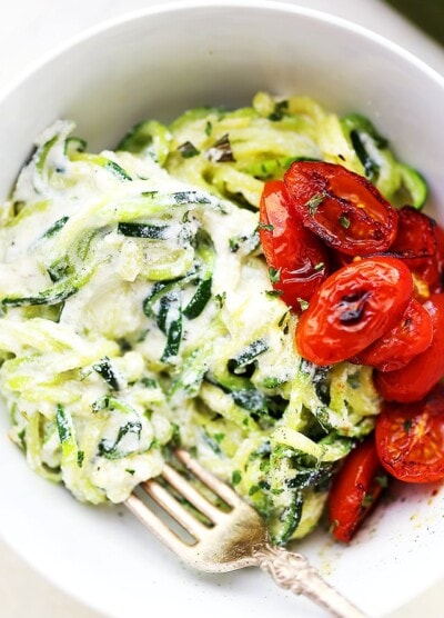 Creamy Ricotta Zucchini Noodles - Delicious zucchini noodles tossed in a creamy and garlicky ricotta cheese sauce. Easy, guilt free and vegetarian weeknight meal that takes minutes to prepare!