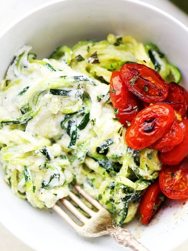 Creamy Ricotta Zucchini Noodles - Delicious zucchini noodles tossed in a creamy and garlicky ricotta cheese sauce. Easy, guilt free and vegetarian weeknight meal that takes minutes to prepare!