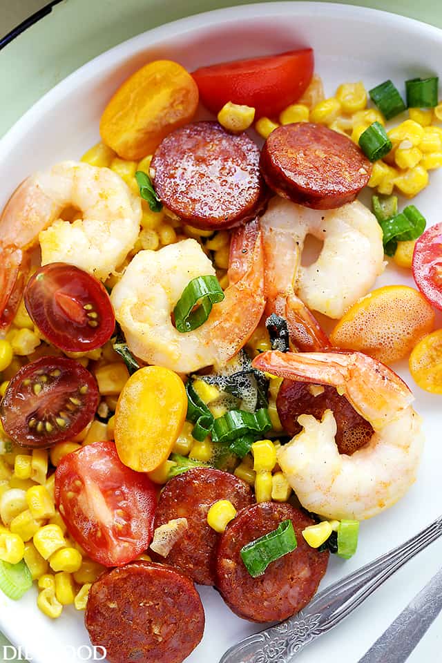 Shrimp, Chorizo and Corn served on a white plate