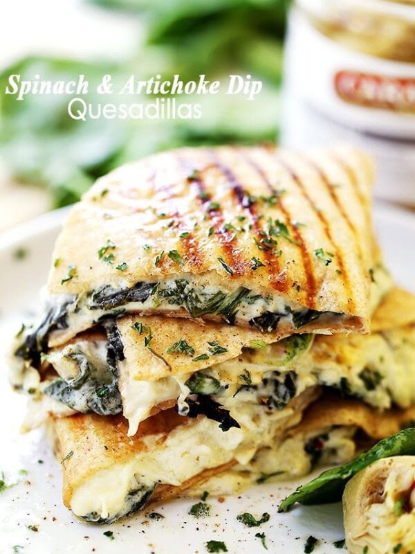 Spinach and Artichoke Dip Quesadillas - Easy to make, quick and delicious quesadillas filled with a rich, yet lightened up spinach and artichoke dip.