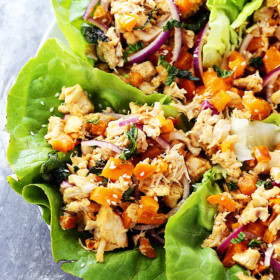 Thai Chicken Lettuce Wraps - Quick and easy Chicken Lettuce Wraps tossed in an incredible Peanut Sauce make for a great weeknight meal option that's full of flavor!