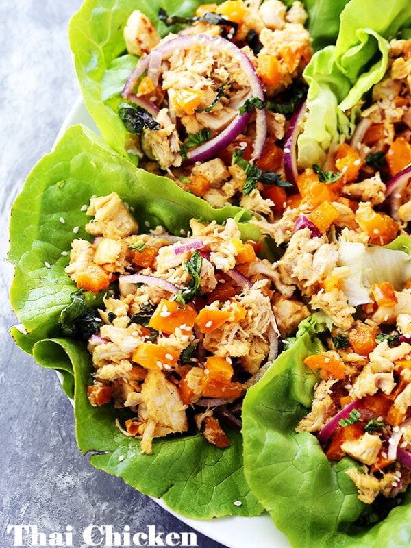 Thai Chicken Lettuce Wraps - Quick and easy Chicken Lettuce Wraps tossed in an incredible Peanut Sauce make for a great weeknight meal option that's full of flavor!