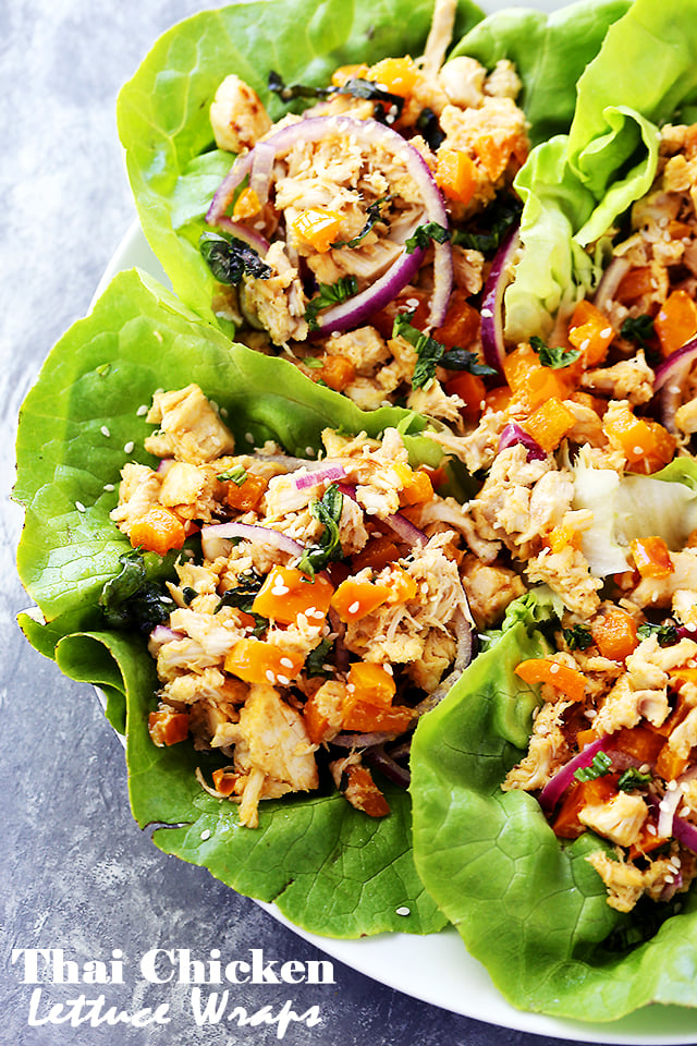 Thai Chicken Lettuce Wraps - Quick and easy Chicken Lettuce Wraps tossed in an incredible Peanut Sauce make for a great weeknight meal option that's full of flavor!