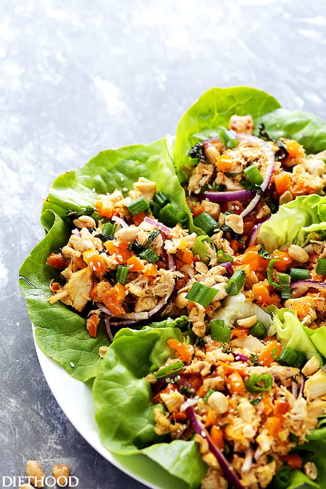 Thai Chicken Lettuce Wraps - Quick and easy Chicken Lettuce Wraps tossed in an incredible Peanut Sauce make for a great weeknight meal option that's full of flavor!