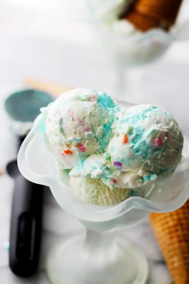 Birthday Cake Ice Cream Recipe - Birthday Cake Ice Cream combines your favorite party treats into one tasty, creamy, super delicious bite! Prepare to have the kid inside of you jump right out.