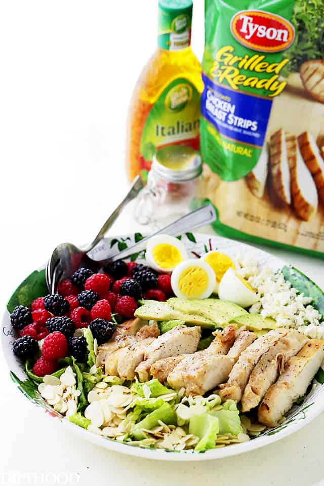 Summer Cobb Salad - Tossed with Italian Dressing, this Cobb Salad is packed with sweet berries, avocado, blue cheese, eggs, and grilled chicken, making it the perfect meal salad for you and your family.