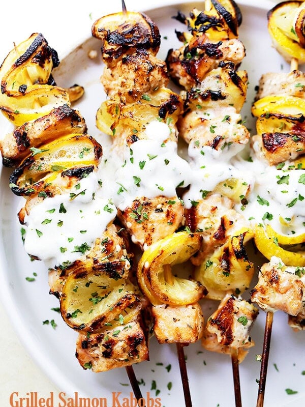 Grilled Salmon Kabobs with Garlic Yogurt Sauce - Tender and moist, these grilled salmon kabobs are juicy with incredible flavor and are served with an amazing garlic yogurt sauce.