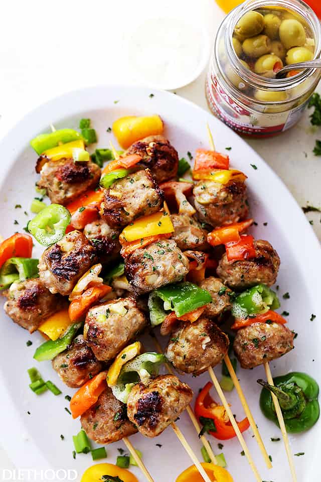 Grilled Mediterranean Turkey Meatballs Skewers - Juicy grilled turkey meatballs stuffed with olives and feta! Makes a delicious dinner, but are also great served as an appetizer, too!