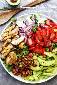 Rosemary Chicken Salad with Avocado and Bacon - A vibrant, fresh, and incredibly delicious chicken salad packed with avocado, bacon, tomatoes and onions, all drizzled with a homemade Rosemary Vinaigrette.