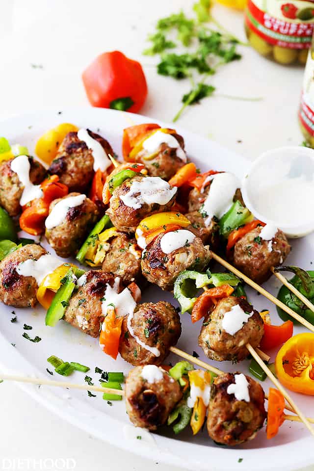 Grilled Mediterranean Turkey Meatballs Skewers - Juicy grilled turkey meatballs stuffed with olives and feta! Makes a delicious dinner, but are also great served as an appetizer, too!
