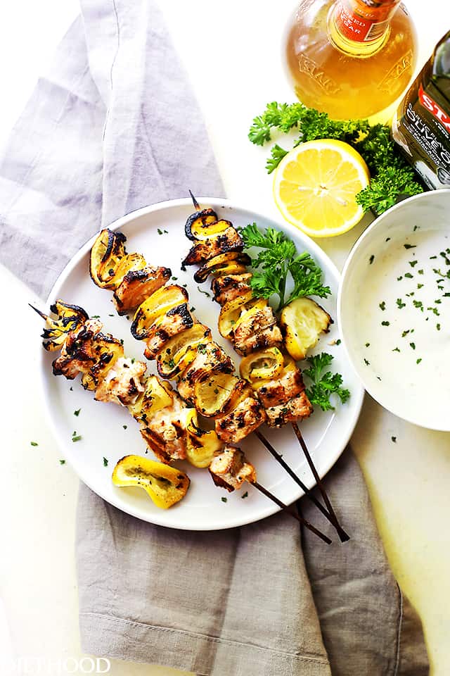 Grilled Salmon Kabobs with Garlic Yogurt Sauce - Tender and moist, these grilled salmon kabobs are juicy with incredible flavor and are served with an amazing garlic yogurt sauce.