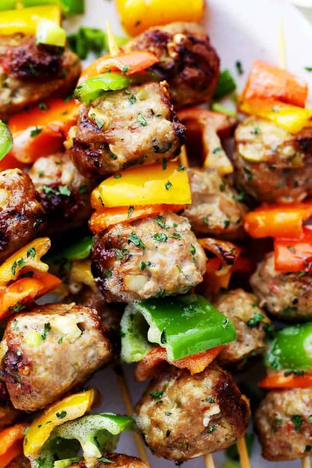 Grilled Mediterranean Turkey Meatballs Skewers - Juicy grilled turkey meatballs stuffed with olives and feta! Makes a delicious dinner, but are also great served as an appetizer, too!