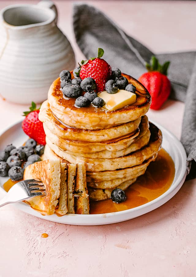 Buttermilk pancakes topped with berries.