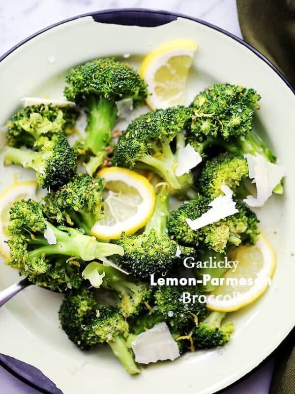 Garlicky Lemon-Parmesan Broccoli - A quick, healthy, delicious, and EASY side dish with steamed broccoli tossed in olive oil with garlic, lemon juice and fresh parmesan!