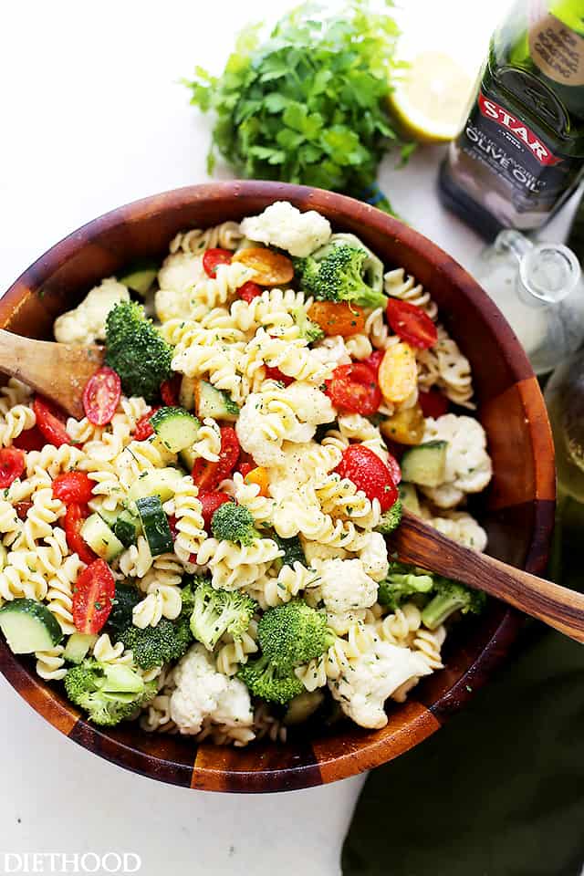 A large bowl of homemade veggie filled pasta salad 