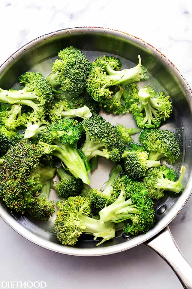 Boiling the broccoli in a pot. 