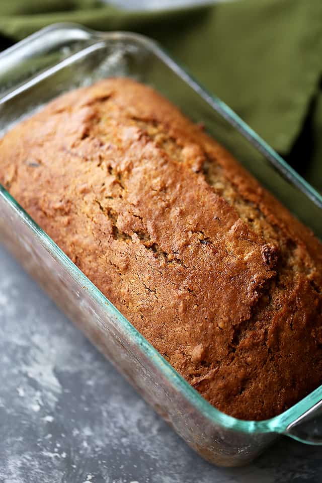 Healthy Apple and Zucchini Bread in a glass loaf pan.