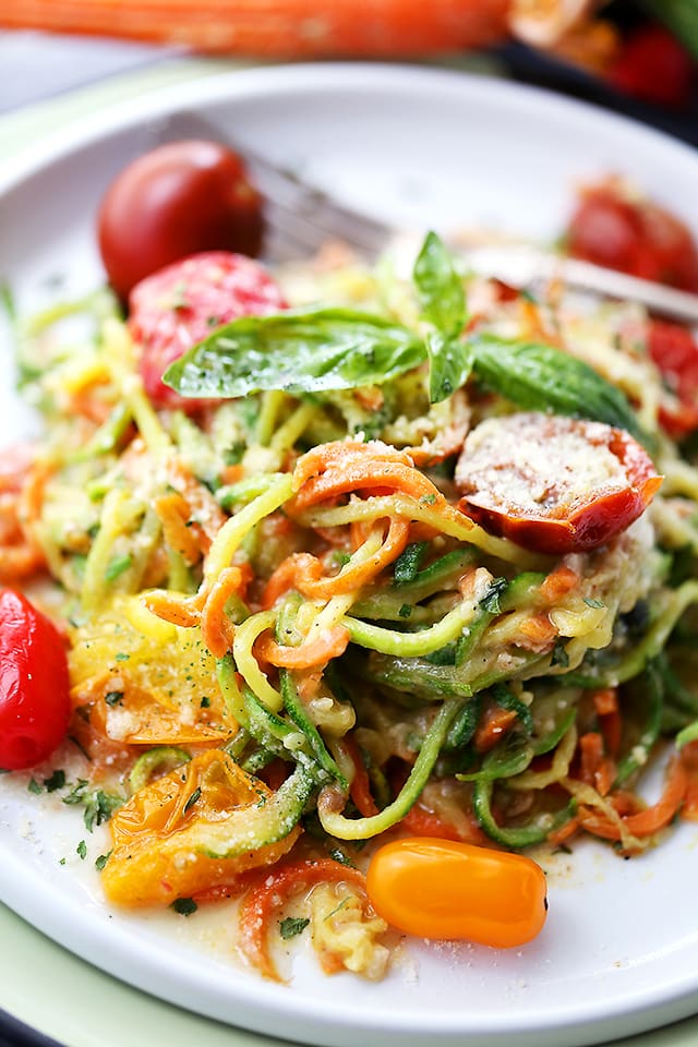 Carrot and Zucchini Noodles in Light Alfredo Sauce - Quick, easy, and healthy dish with carrots and zucchini "noodles" tossed in a light alfredo sauce. Fresh and delicious!