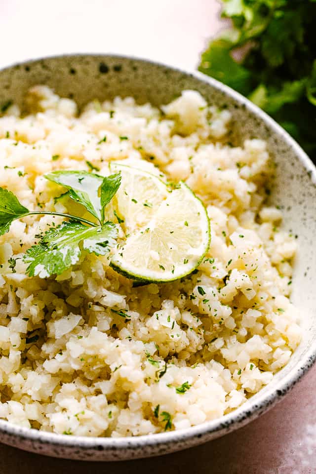 serving riced cauliflower in a bowl