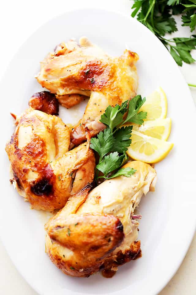 Crock Pot Honey Lemon Chicken Recipe - Rubbed with lemon-pepper butter and a sweet honey sauce, this is the easiest, most delicious whole chicken prepared in the crock pot! 