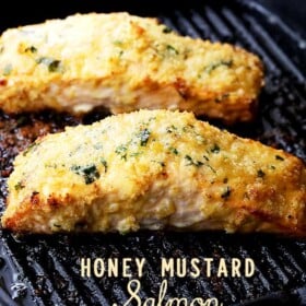 Honey Mustard Salmon - Flavorful and juicy salmon fillets brushed with tasty honey mustard and coated with a deliciously crunchy crumb topping.