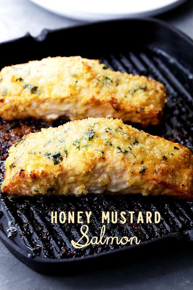 Honey Mustard Salmon cooking in cast iron skillet