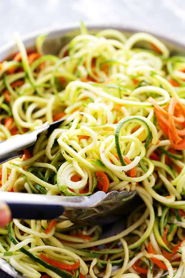 Carrot and Zucchini Noodles in Light Alfredo Sauce - Quick, easy, and healthy dish with carrots and zucchini "noodles" tossed in a light alfredo sauce. Fresh and delicious!