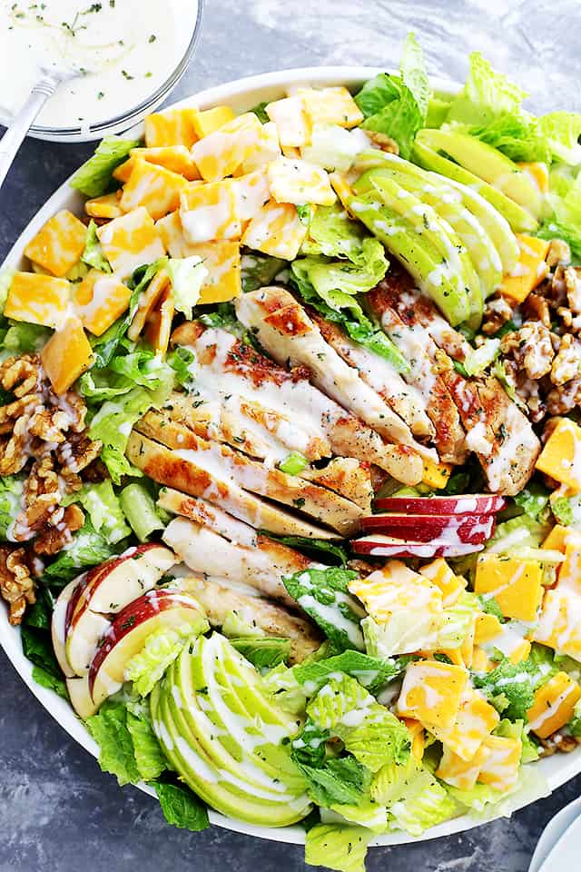 Apples and Cheddar Chicken Salad Recipe - Apples, cheddar cheese and walnuts pack a delicious crunchy bite in this Chicken Salad with Honey Yogurt Dressing.