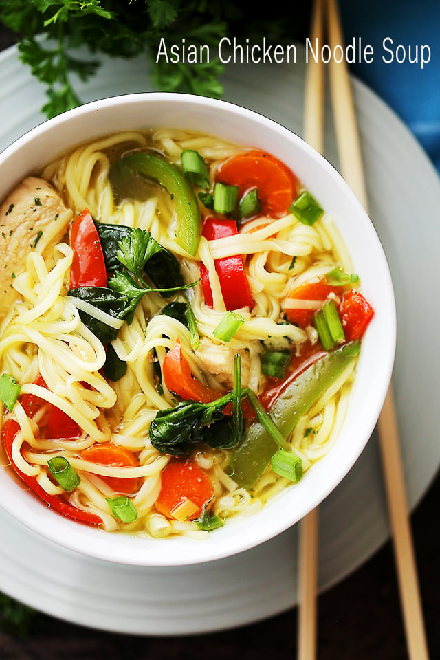 Asian Chicken Noodle Soup - A flavorful and delicious twist on the classic Chicken Noodle Soup featuring ginger, teriyaki sauce, egg noodles, and colorful vegetables, and it's ready in about 30 minutes!