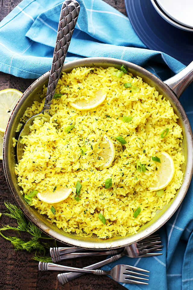 Wide shot of lemon rice in a skillet.