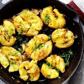 Garlic Butter and Soy Sauce Smashed Potatoes - Flavored with garlic butter and soy sauce, these crazy delicious smashed potatoes are the best side of potatoes you'll ever have! I promise!