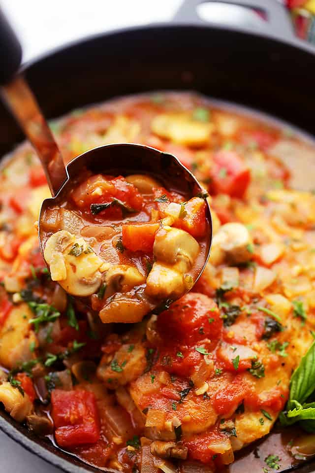 Chicken Marengo - Saucy, a little spicy, and a whole lot delicious French-inspired chicken dish topped with tomatoes and mushrooms!