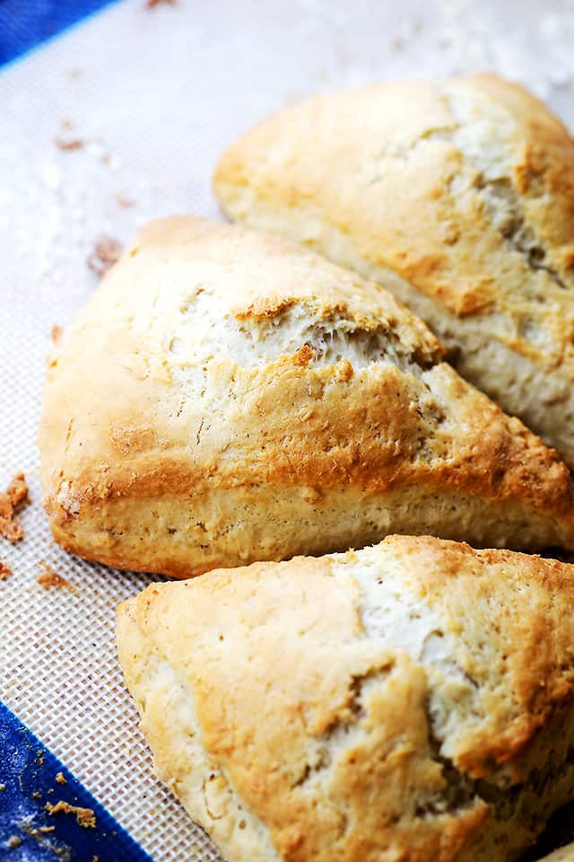 Close up image of golden baked pumpkin spice scones.