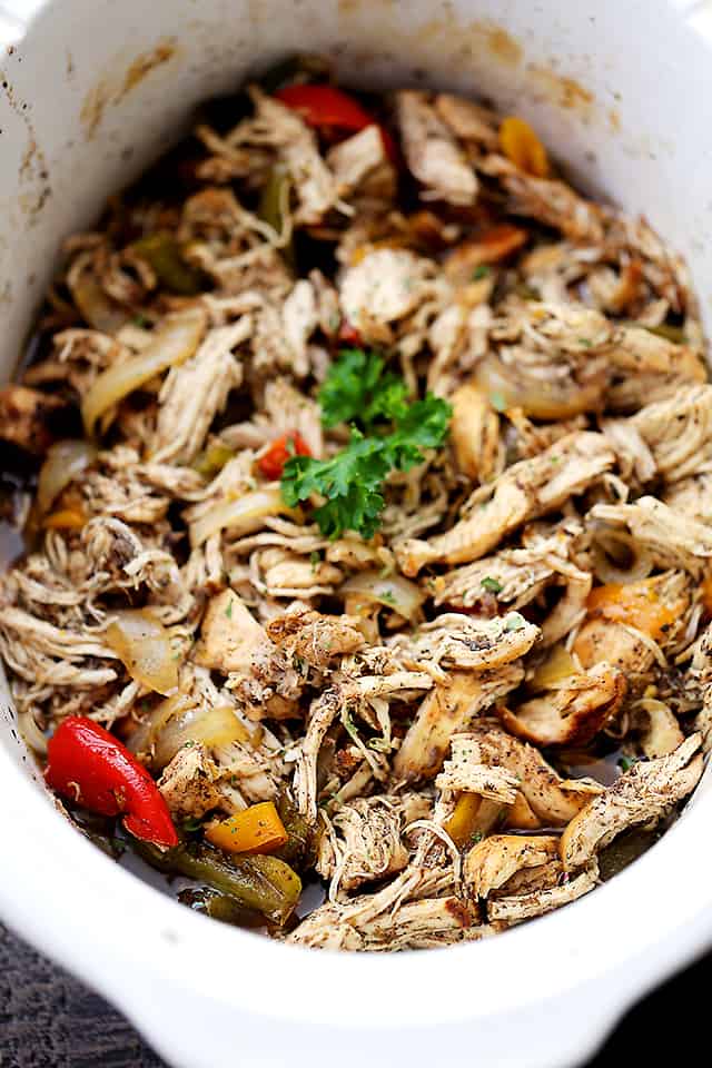 Shredded chicken in a slow cooker tossed with balsamic sauce.