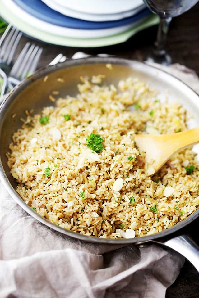 Almond Brown Rice Pilaf - Turn simple brown rice into a delicious healthy dish with toasted almonds, sweet shallots and parsley!